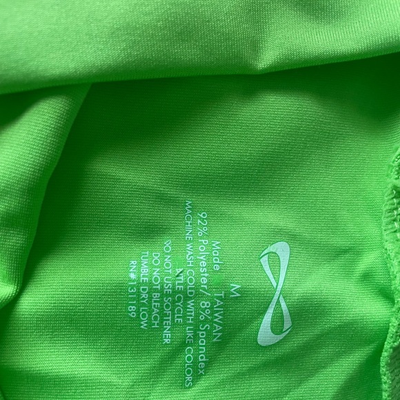 Lime green Nfinity shorts from a non smoking and hypoallergenic home. NEVER worn - Picture 2 of 5